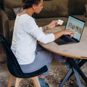 A Woman Shopping On Line with Her Credit Card